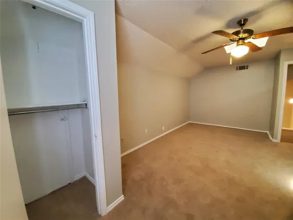 a kitchen with stainless steel appliances a refrigerator and a stove