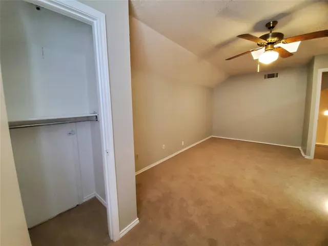 a kitchen with stainless steel appliances a refrigerator and a stove