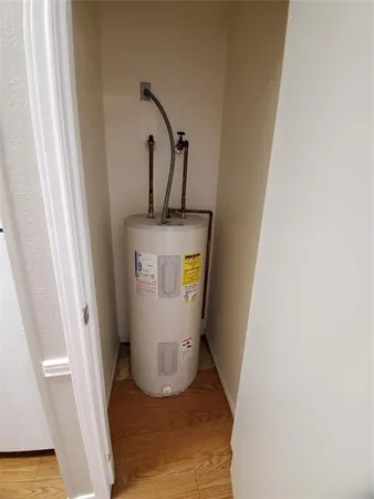 a white refrigerator freezer sitting in a kitchen