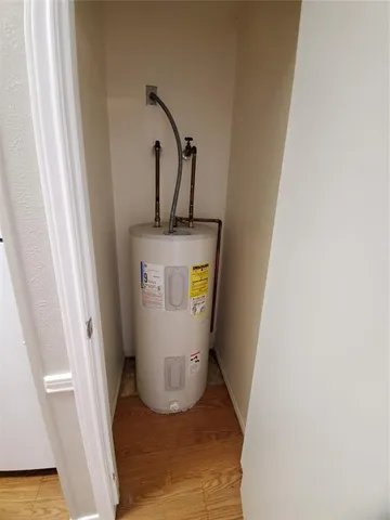 a white refrigerator freezer sitting in a kitchen