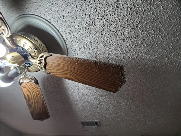 a view of staircase with white walls