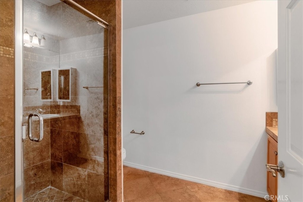 21345 Hawthorne Boulevard, Unit 217 Torrance, CA 90503 - Photo 12 of 41 a bathroom with a shower