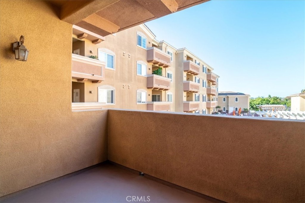 21345 Hawthorne Boulevard, Unit 217 Torrance, CA 90503 - Photo 13 of 41 a view of an buildings from a balcony