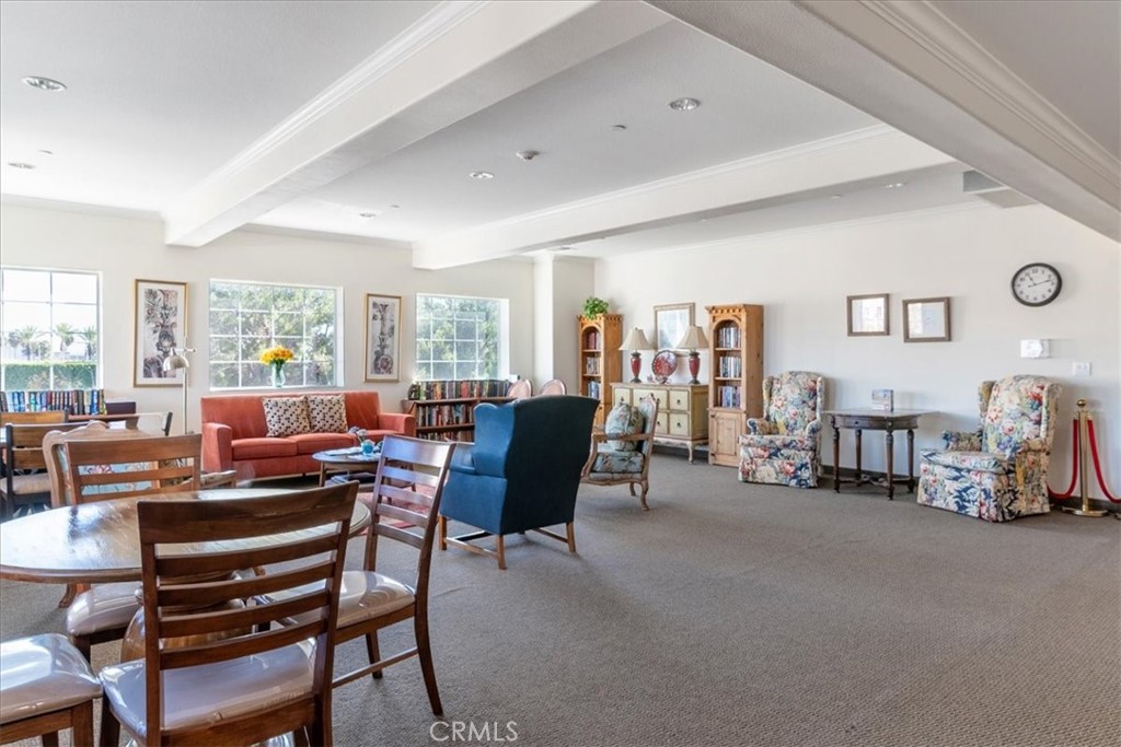 21345 Hawthorne Boulevard, Unit 217 Torrance, CA 90503 - Photo 16 of 41 a living room with furniture and a large window