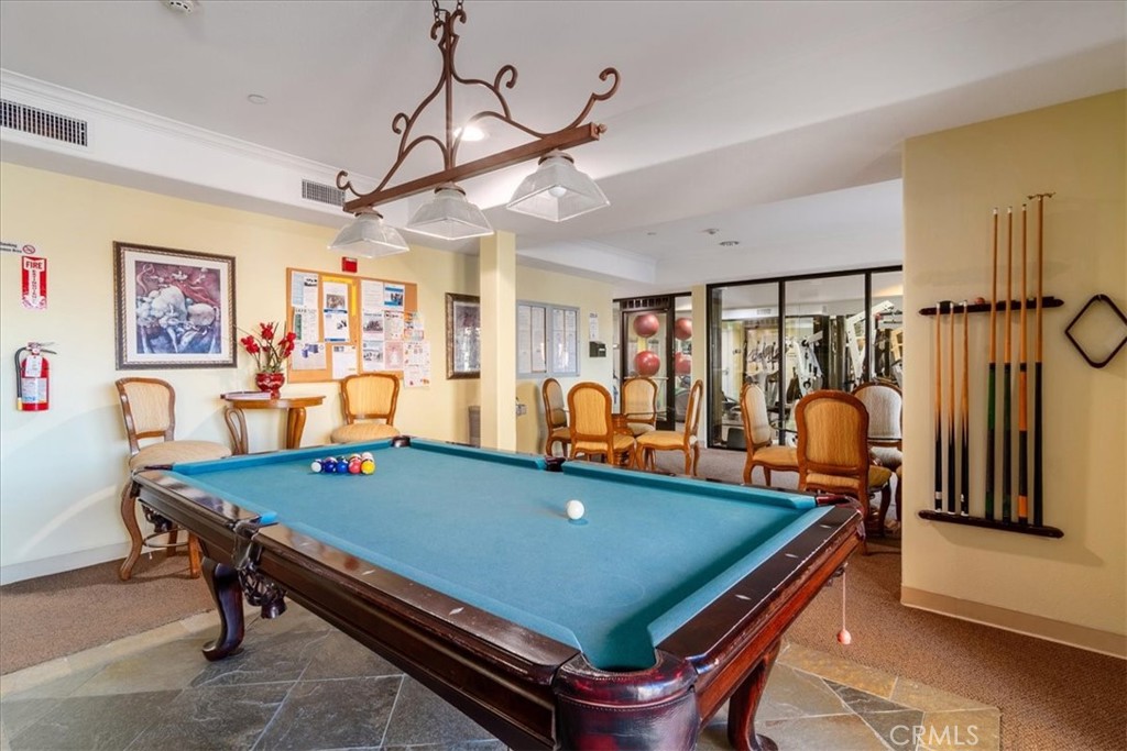 21345 Hawthorne Boulevard, Unit 217 Torrance, CA 90503 - Photo 24 of 41 a room with furniture pool table and window