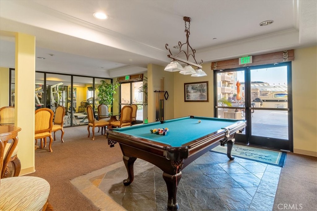 21345 Hawthorne Boulevard, Unit 217 Torrance, CA 90503 - Photo 25 of 41 a room with pool table and windows