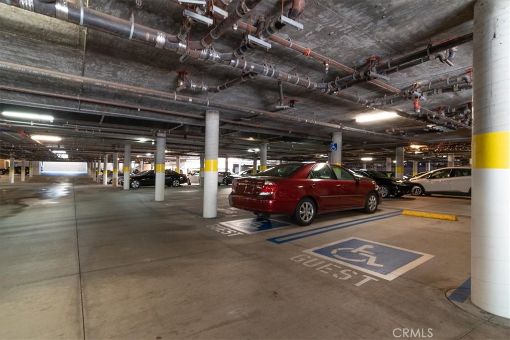 21345 Hawthorne Boulevard, Unit 217 Torrance, CA 90503 - Photo 40 of 41 a view of parking garage with cars parked