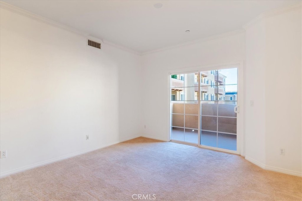21345 Hawthorne Boulevard, Unit 217 Torrance, CA 90503 - Photo 7 of 41 a view of an empty room with a window