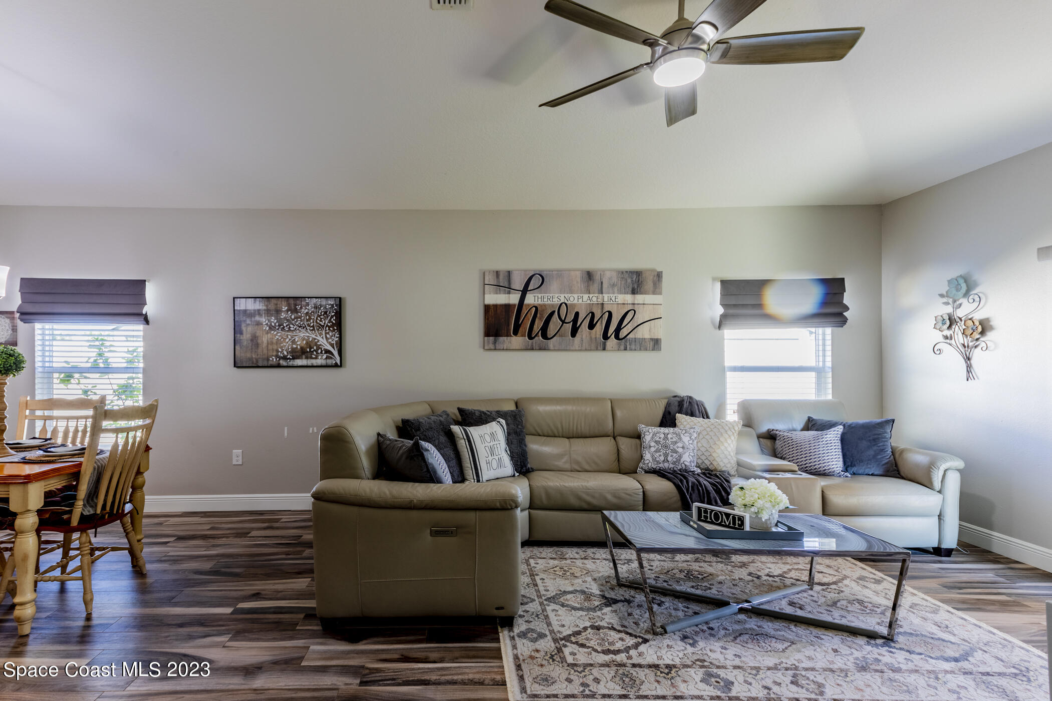 2995 Louetta Circle Melbourne, FL 32901 - Photo 23 of 42 a living room with furniture and a rug