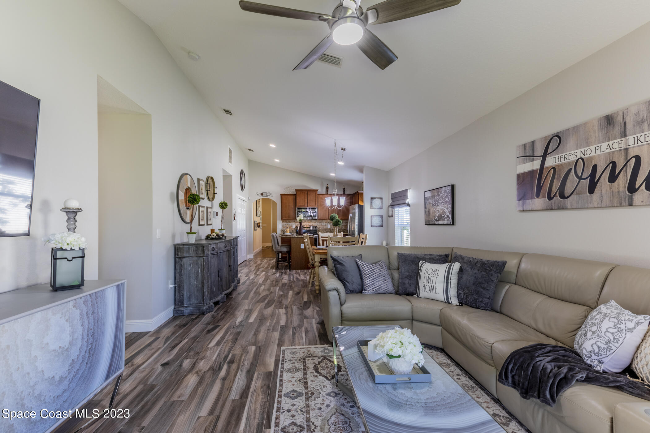 2995 Louetta Circle Melbourne, FL 32901 - Photo 24 of 42 a living room with furniture and wooden floor