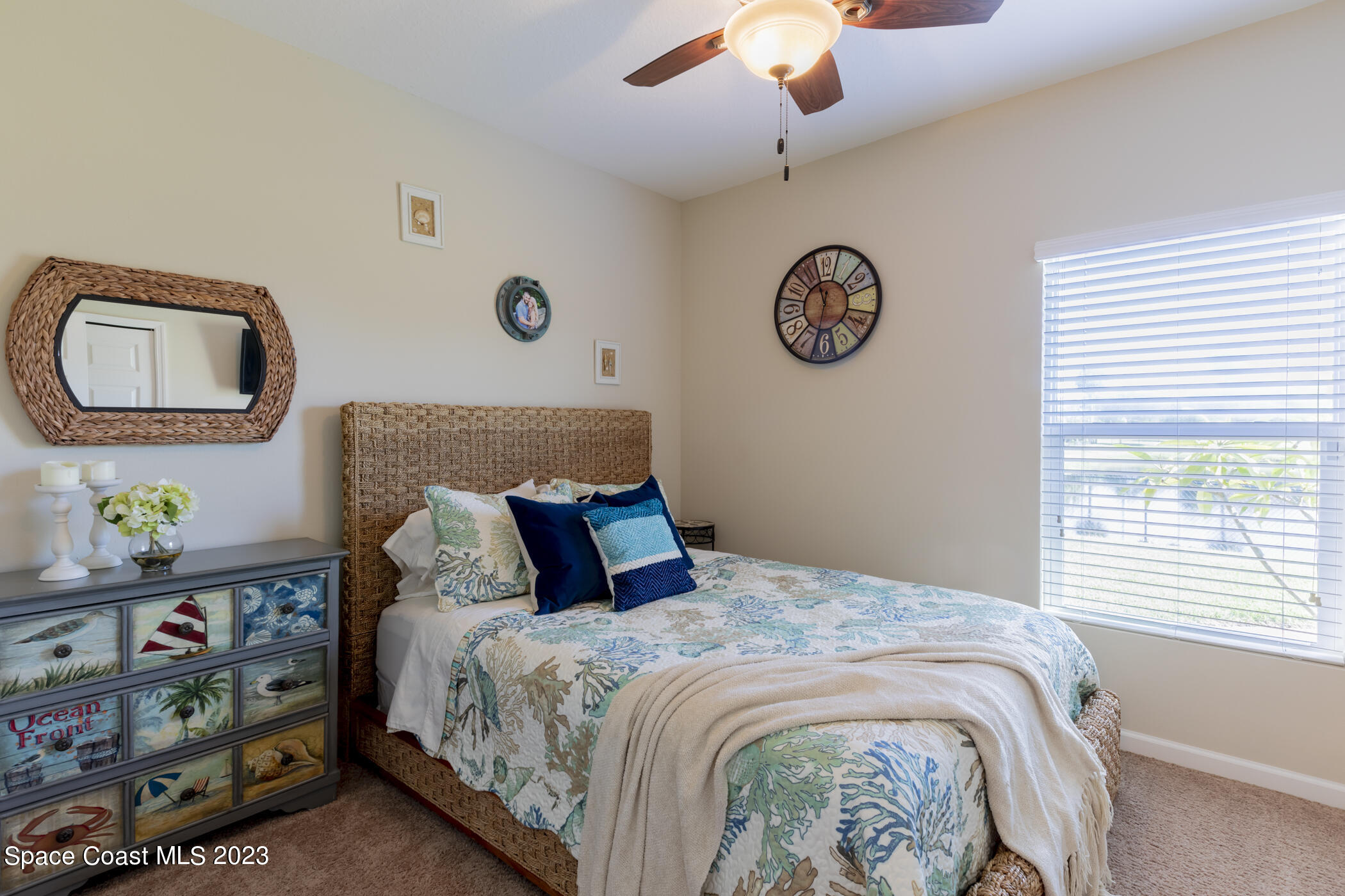 2995 Louetta Circle Melbourne, FL 32901 - Photo 31 of 42 a bedroom with a bed and a window