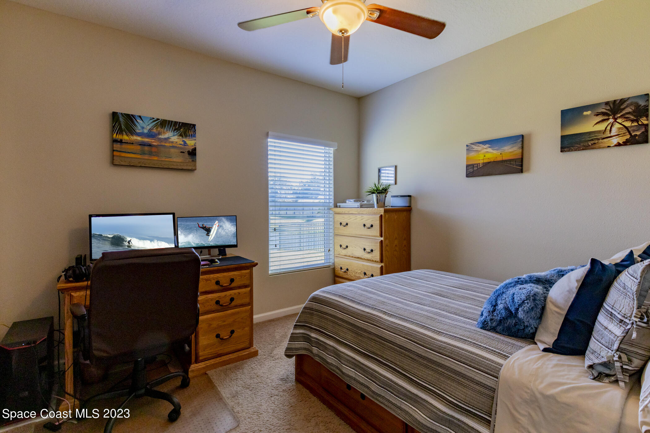 2995 Louetta Circle Melbourne, FL 32901 - Photo 33 of 42 a bedroom with a bed and furniture