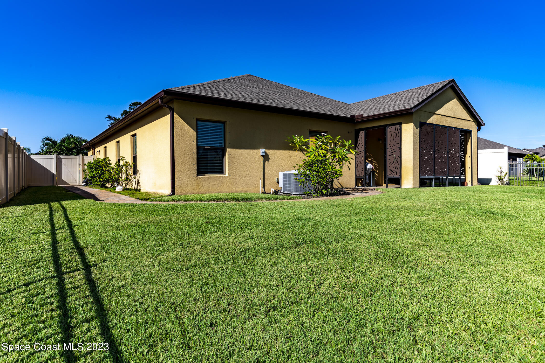 2995 Louetta Circle Melbourne, FL 32901 - Photo 41 of 42 a front view of a house with a yard