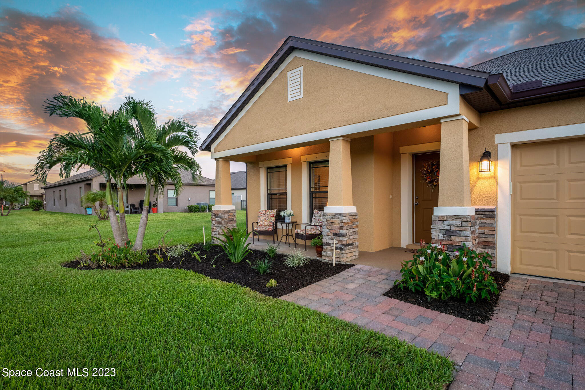 2995 Louetta Circle Melbourne, FL 32901 - Photo 8 of 42 a front view of a house with garden