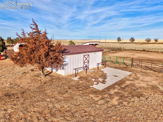 16830 Finch Road Colorado Springs, CO 80928 - Photo 43 of 49 24' x 16' tack barn next to the riding arena with power, water, and a hitching post