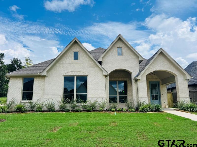2983 Guinn Farms Road Tyler, TX 75707 - Photo 1 of 22 a front view of a house with a yard