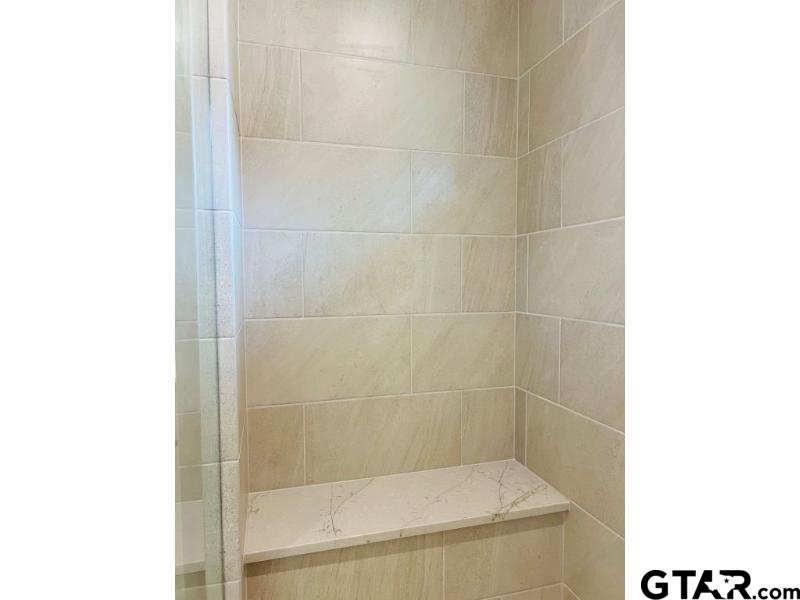 2983 Guinn Farms Road Tyler, TX 75707 - Photo 13 of 22 a bathroom with a shower