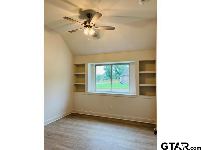 2983 Guinn Farms Road Tyler, TX 75707 - Photo 16 of 22 a view of an empty room with a window