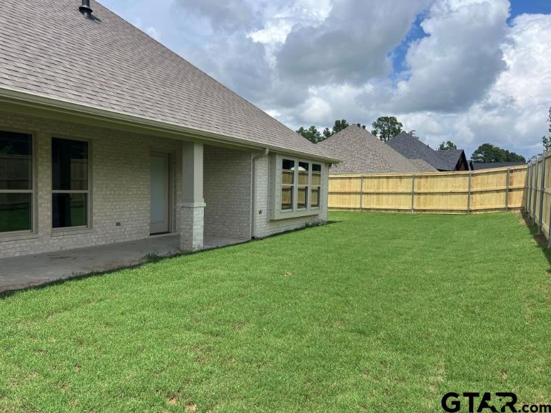 2983 Guinn Farms Road Tyler, TX 75707 - Photo 22 of 22 a view of a backyard of the house
