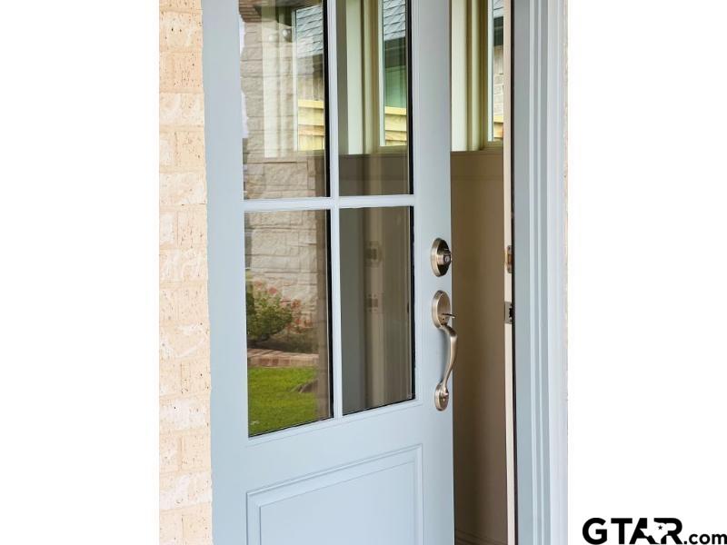 2983 Guinn Farms Road Tyler, TX 75707 - Photo 3 of 22 a view of a door and a window