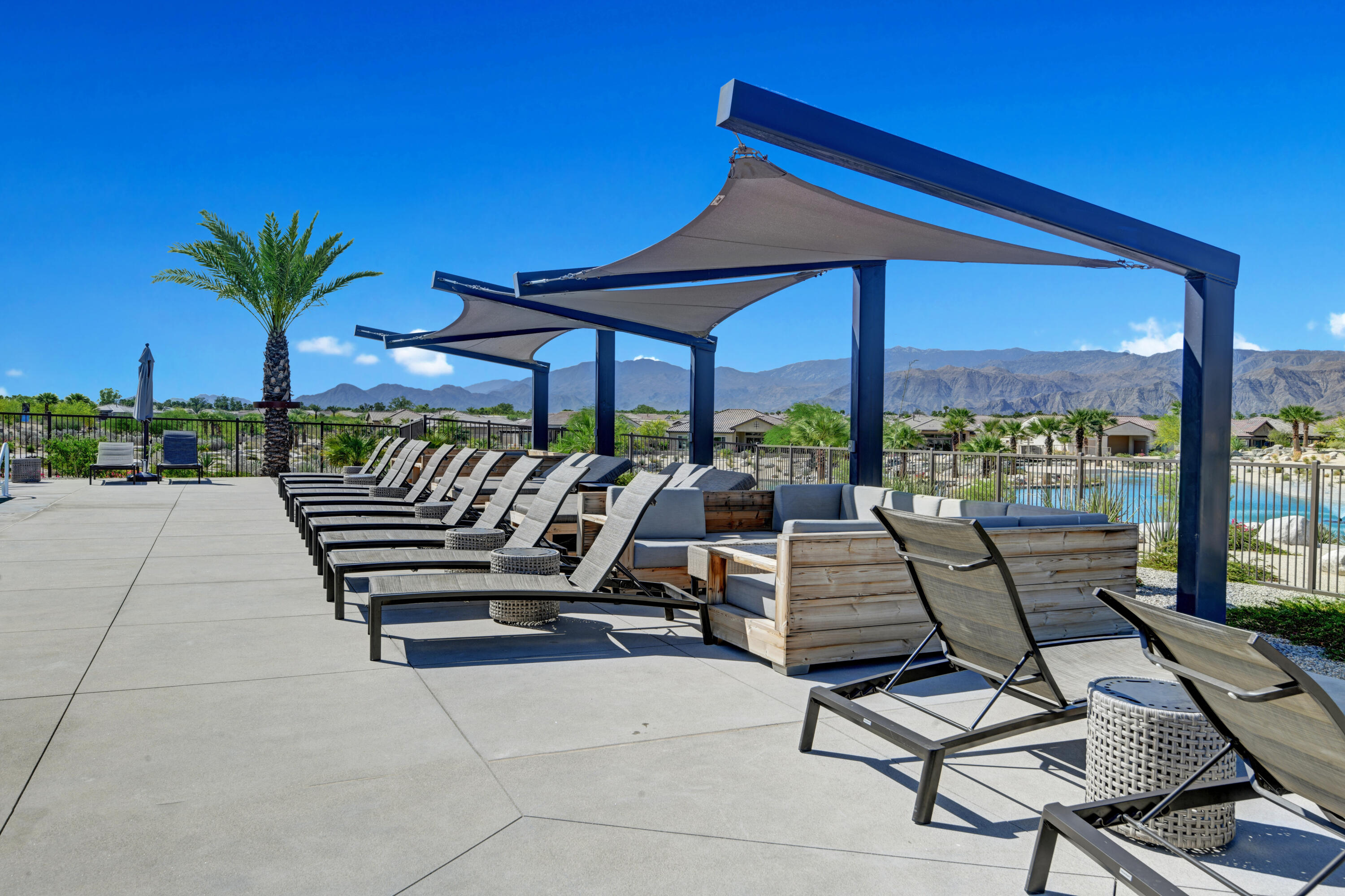 61 Claret Road Rancho Mirage, CA 92270 - Photo 36 of 37 CLUBHOUSE POOL CHAISES TO MOUNTAINS