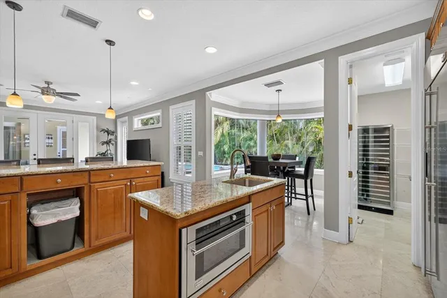a view of a dining room and a table and chairs in a room