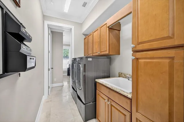 a living room with furniture ceiling fan and a wooden floor