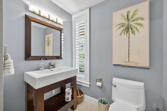 a living room with fireplace furniture and a flat screen tv