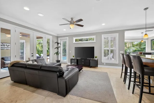 a room with pool table and flat screen tv