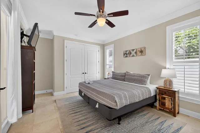 a bathroom with a granite countertop sink toilet a mirror and shower