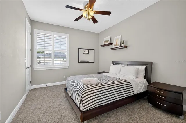 a bathroom with a toilet and a bathtub