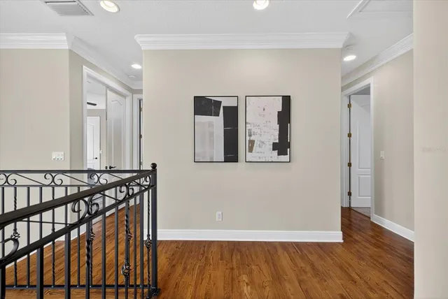 a spacious bedroom with a bed and window