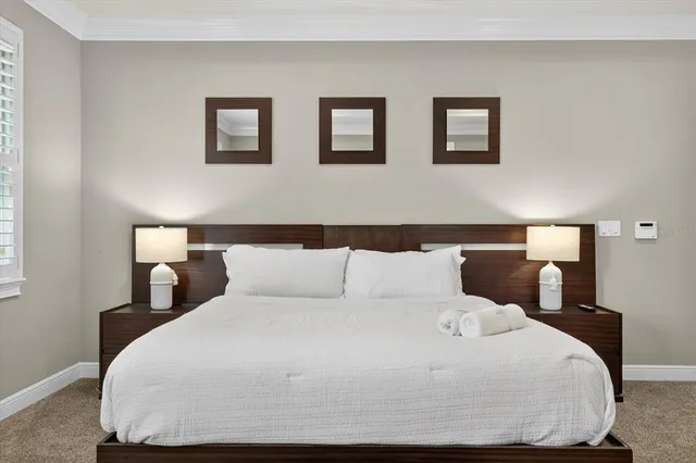 a view of a patio with chair and tables back yard of the house