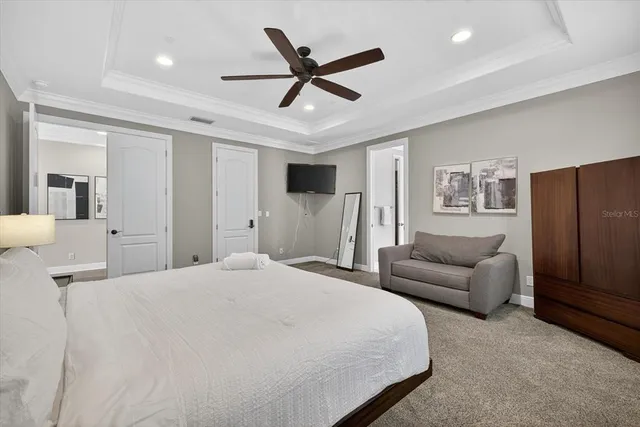 a view of an house with backyard porch and sitting area