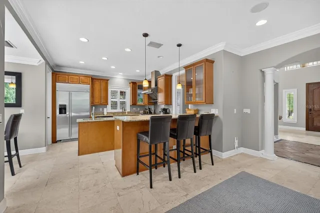 a kitchen with stainless steel appliances granite countertop a stove and a sink