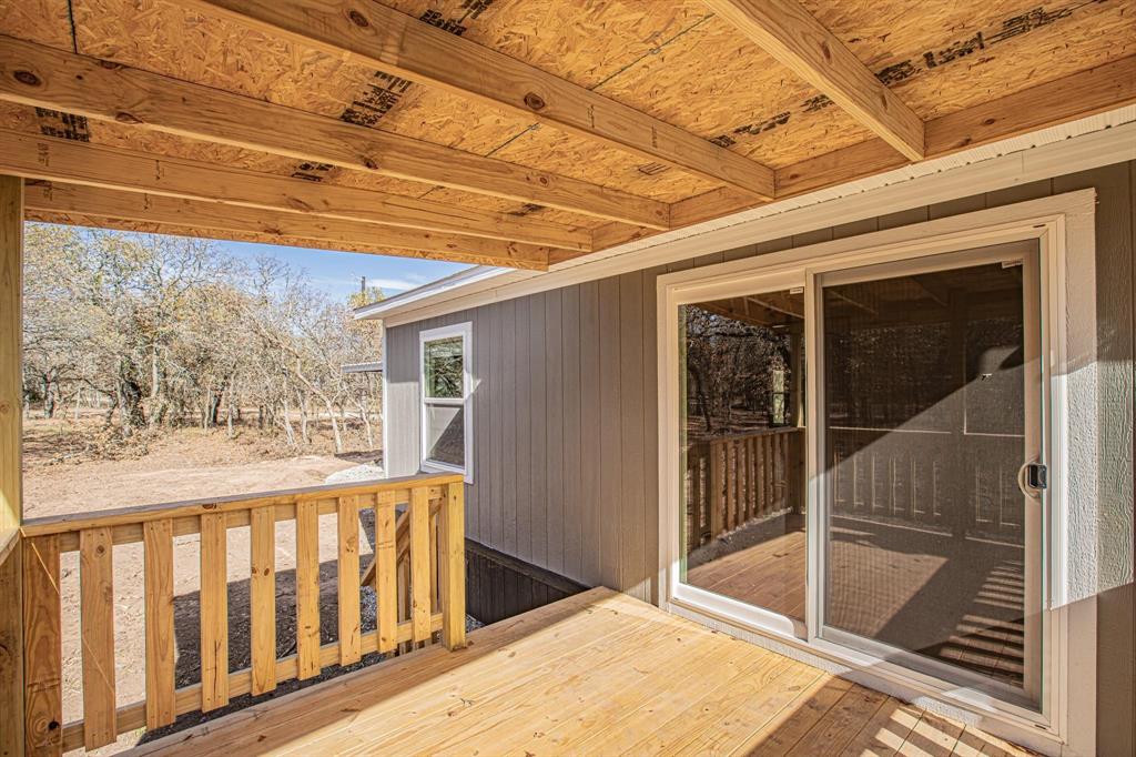 332 Huddleston Road Sunset, TX 76270 - Photo 27 of 28 a view of a porch