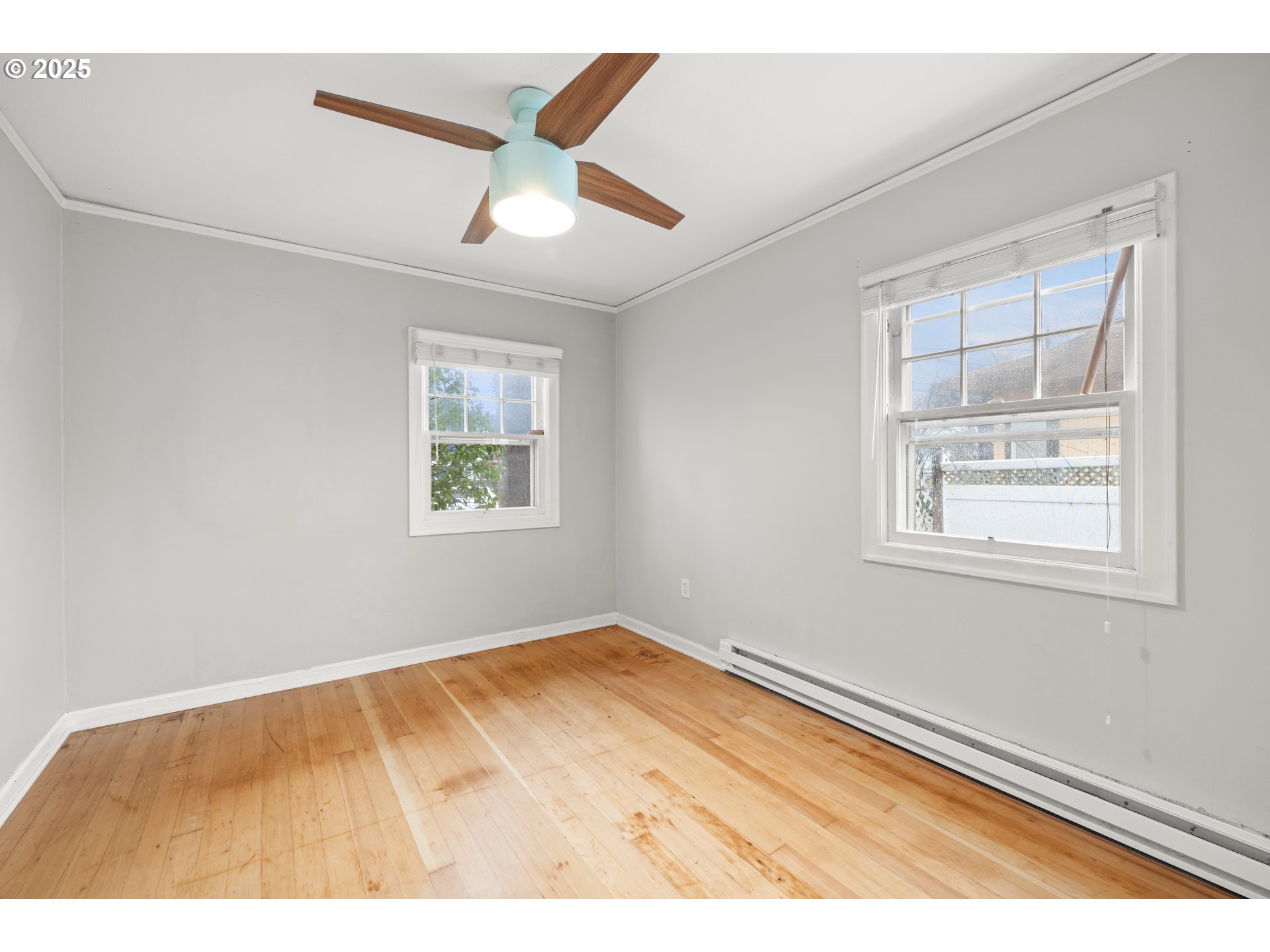 7104 Southeast Tolman Street Portland, OR 97206 - Photo 16 of 34 a view of an empty room with a window