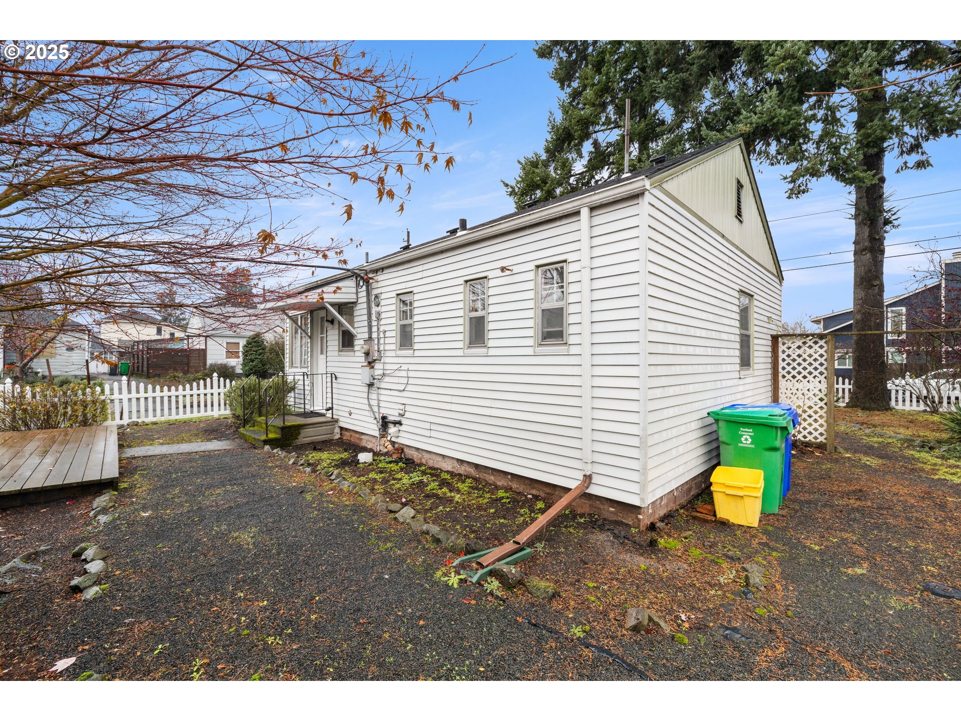 7104 Southeast Tolman Street Portland, OR 97206 - Photo 28 of 34 a view of a small yard in front of a house