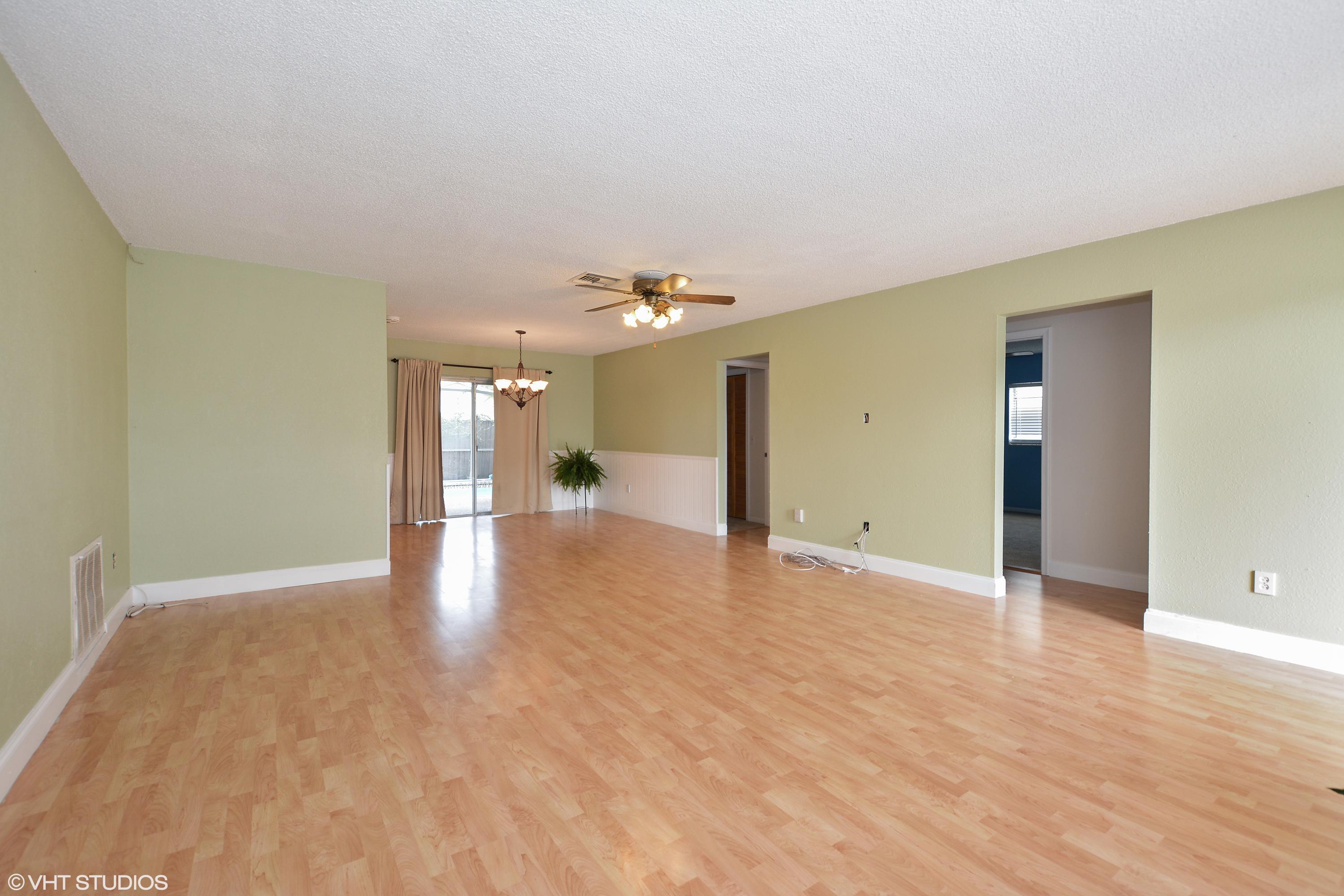 8967 Southwest 7th Street Boca Raton, FL 33433 - Photo 3 of 28 03_8967SW7thSt_93_LivingRoomDiningRoom_H
