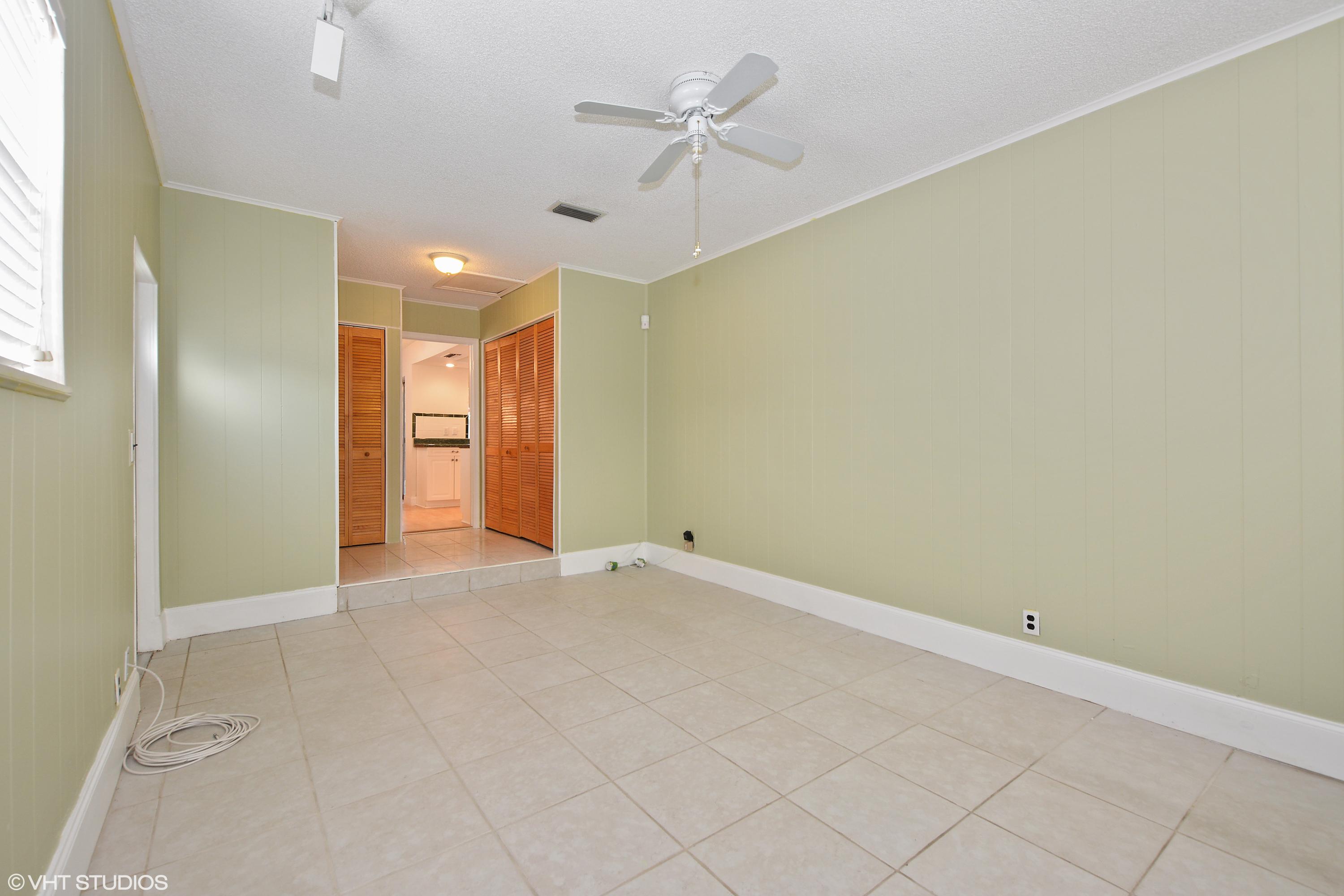 8967 Southwest 7th Street Boca Raton, FL 33433 - Photo 8 of 28 08_8967SW7thSt_3_FamilyRoom_HiRes