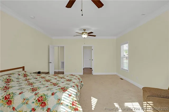 a view of a hallway with closet and wooden floor