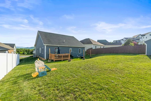 a house with swimming pool in front of it