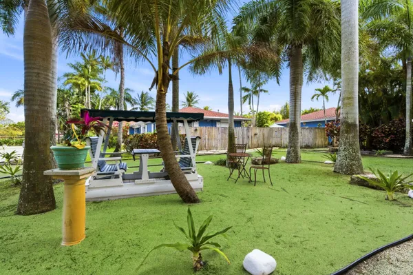 a view of a garden with a patio