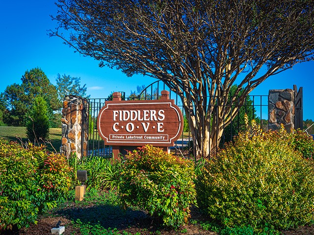 0 Panda Parkway Tamassee, SC 29686 - Photo 4 of 8 Welcome to the private lakefront community, with lush landscaping and secure entrance.