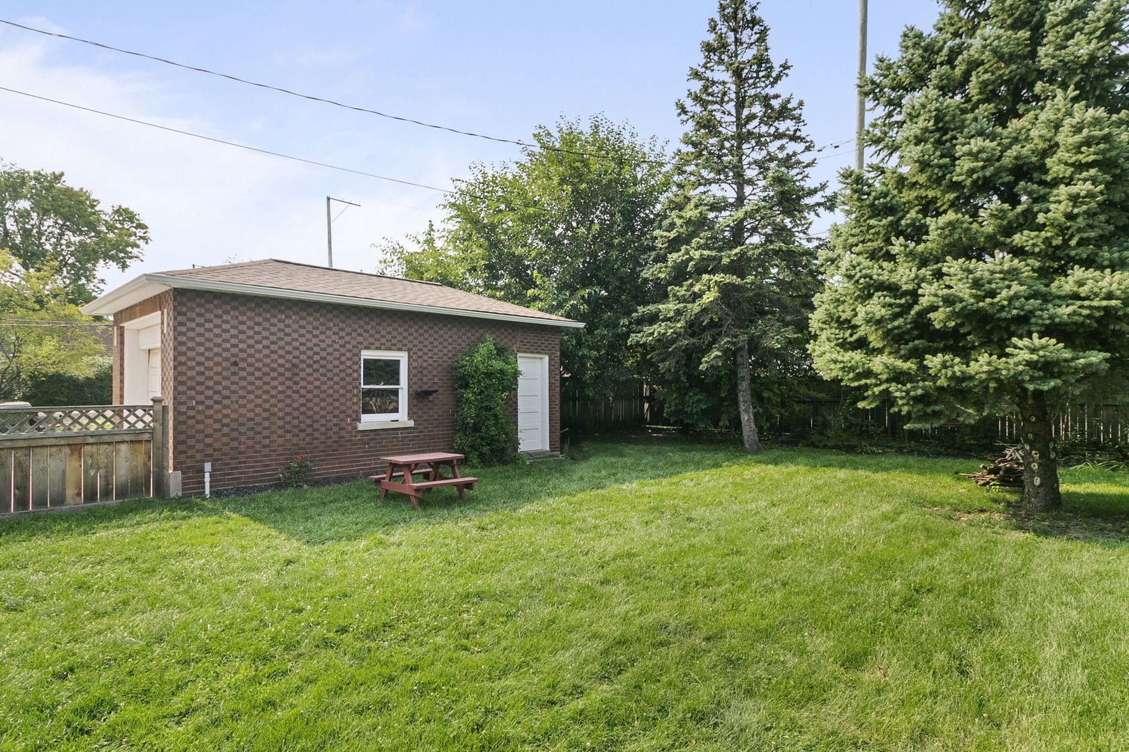 118 Northgate Road Riverside, IL 60546 - Photo 21 of 29 a view of a house with a yard and sitting area