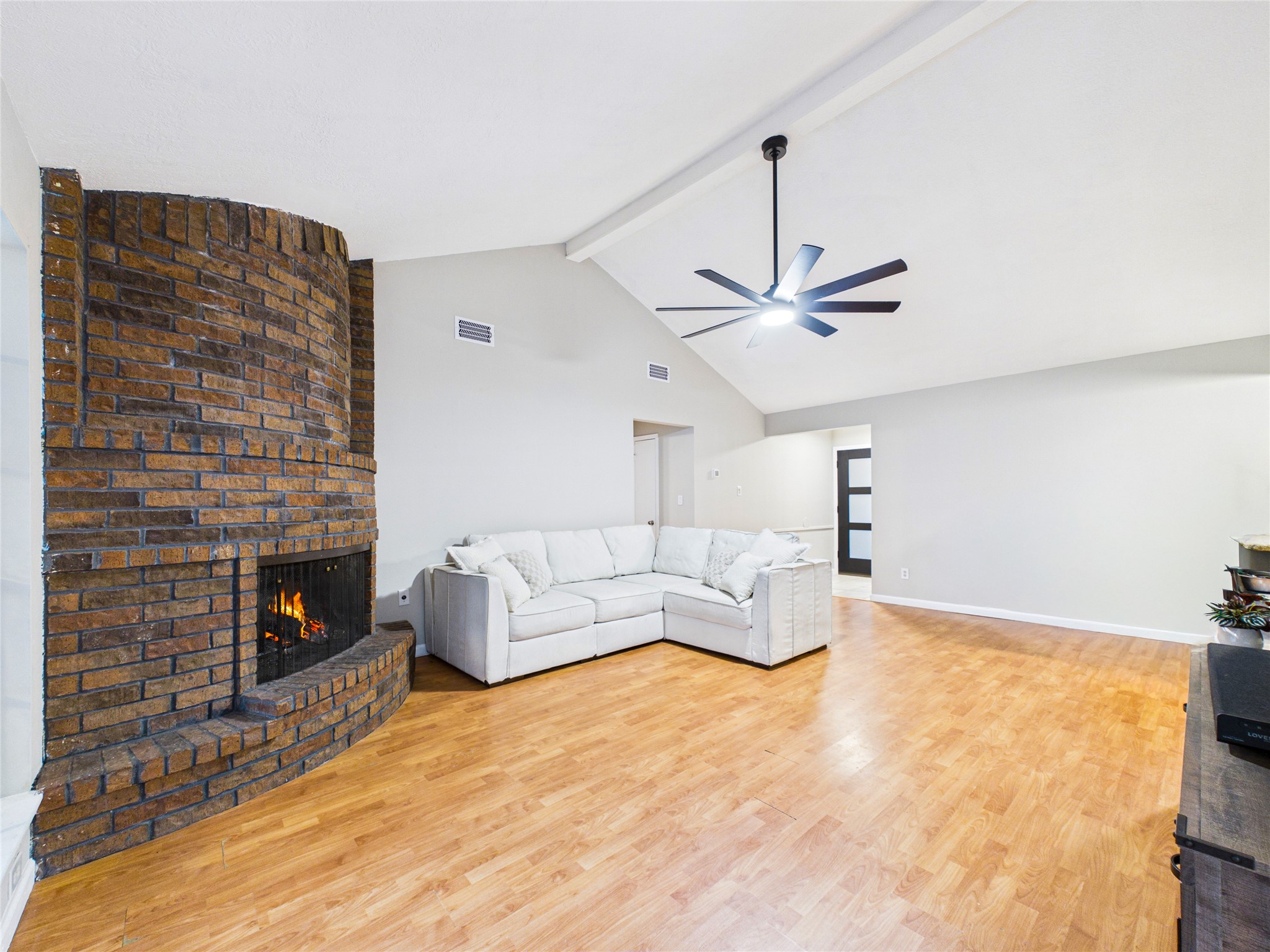 10306 Rustic Rock Road La Porte, TX 77571 - Photo 7 of 38 a living room with furniture and a fireplace