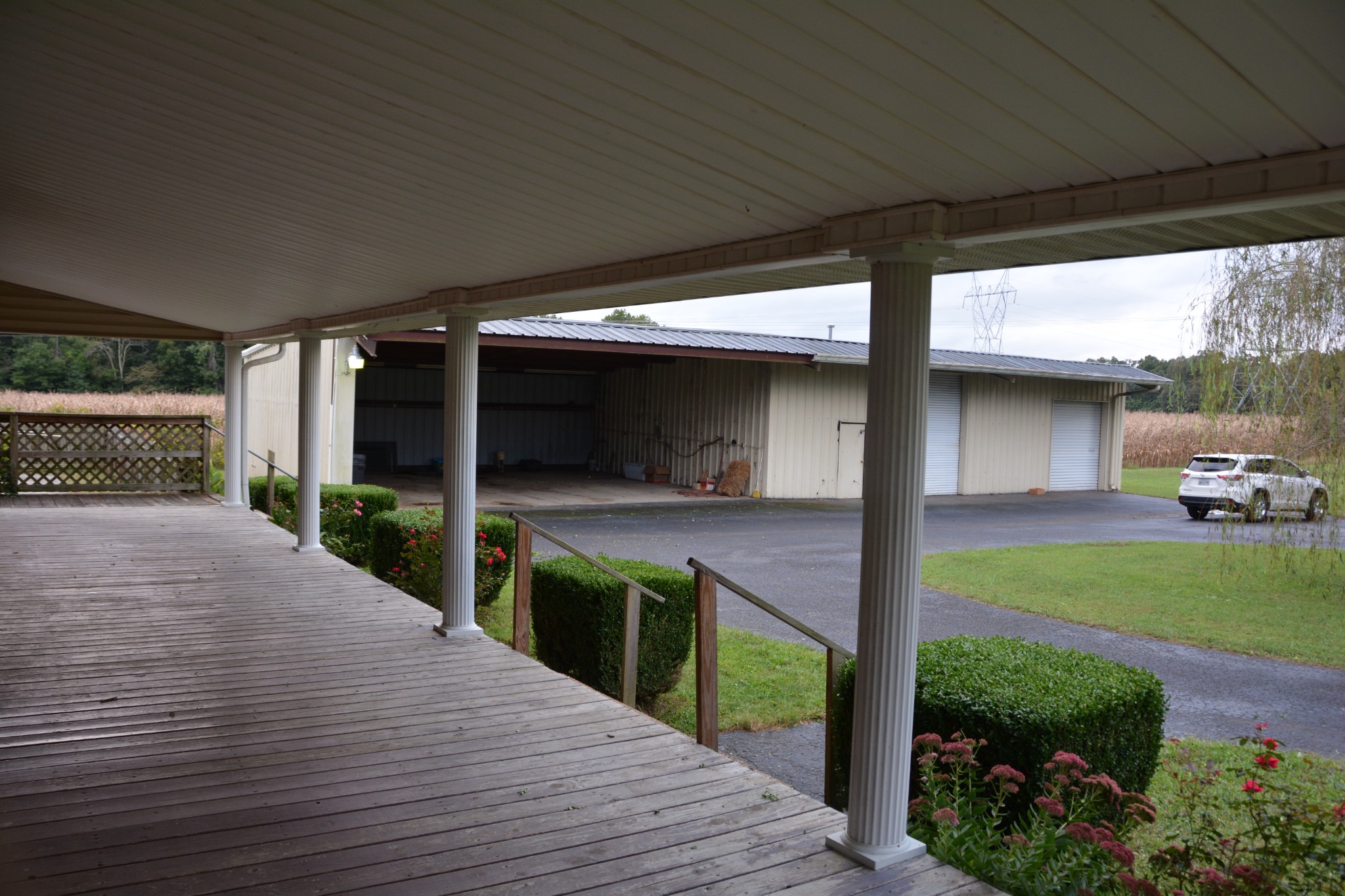 95 Essie Cleek Road Tullahoma, TN 37388 - Photo 8 of 38 a view of a porch with furniture and garden