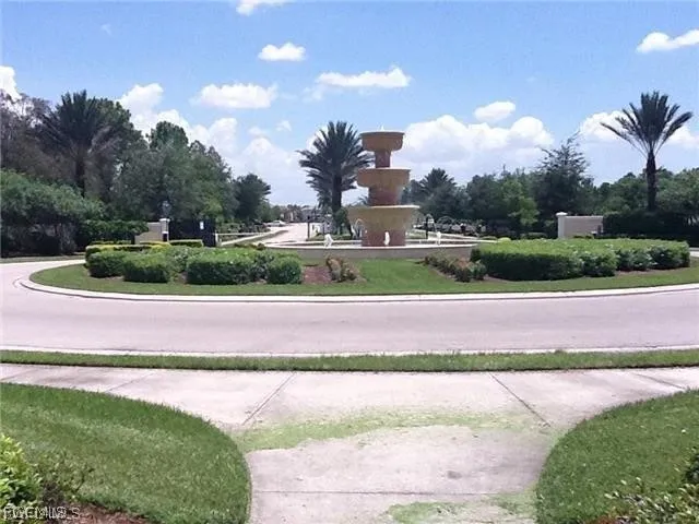 a view of a yard in front of a house