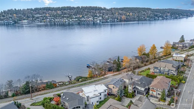 an aerial view of a house with a lake view