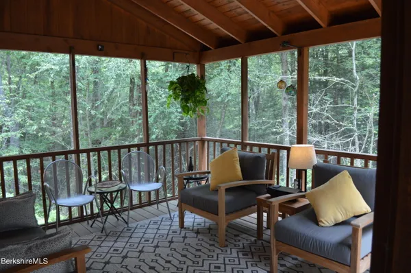 a picture of a bench in a white building